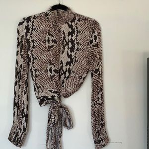 Snakeskin wrap tie bottom blouse